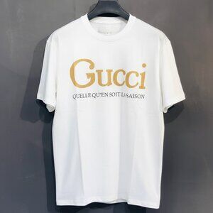 Luxury White T-shirt with Metallic Gold Gucci Logo Print
